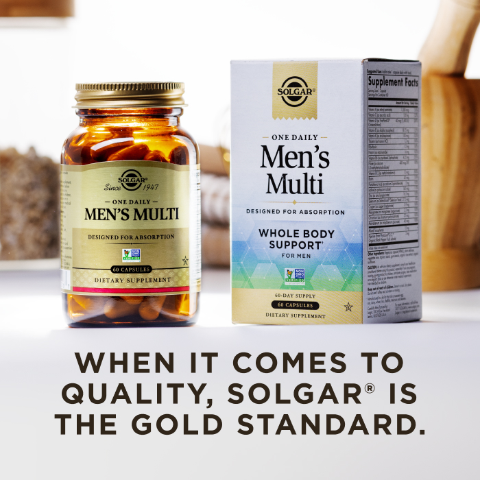 A box of Solgar One Daily Men's Multi with an amber glass bottle of the product beside it. The box and bottle are in a kitchen scene on a white countertop. The image says, "When it comes to quality, Solgar is the Gold Standard."
