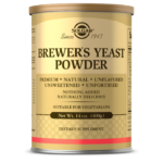 A container of Solgar's Brewer's Yeast Powder on a white backdrop.