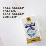 A hand holds a bottle of Solgar's Full Spectrum Curcumin Sleep Ease Licaps™ in front of a soft light. Text reads "advanced sleep formula with full spectrum curcumin, PharmaGABA, melatonin, Venetron"