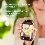 A woman holds a bottle of Solgar's Earth Source® Multi-Nutrient Tablets up to the foreground, with text reading "advanced, complete formula. Immune support and daily energy support."