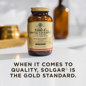 A bottle of Solgar's Ester-C® Plus 1000 mg Vitamin C Vegetable Capsules (Ester-C® Ascorbate Complex) on a surface. Text reads "When it comes to quality, Solgar is the gold standard."