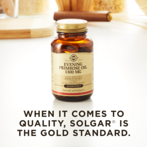 A bottle of Solgar's Evening Primrose Oil 1300 mg Softgels on a kitchen surface. Text reads "When it comes to quality, Solgar is the gold standard."