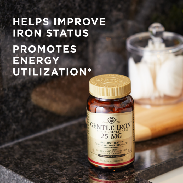 Solgar's Gentle Iron Vegetable Capsules bottle on a counter with text reading: "Helps promote iron status. Promotes energy utilization*"