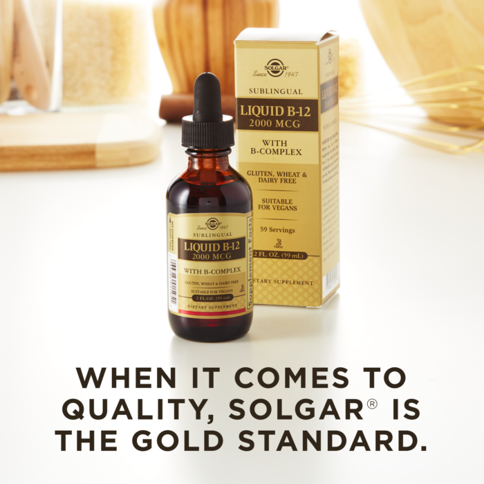 A bottle of Solgar's Sublingual Liquid B-12 2000 mcg with B-Complex next to its outer packaging on a kitchen surface. Text reads "When it comes to quality, Solgar is the gold standard."