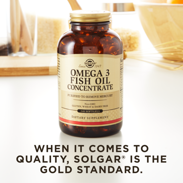 Solgar's Omega-3 Fish Oil Concentrate Softgels on a kitchen backdrop. Text reads "when it comes to quality, Solgar is the gold standard."