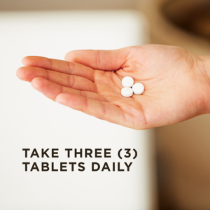 A hand holds three of Solgar's Magnesium with Vitamin B6 Tablets. Text reads "take three tablets daily"