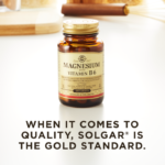 A bottle of Solgar's Magnesium with Vitamin B6 Tablets on a kitchen countertop. Text reads "When it comes to quality, Solgar is the gold standard."