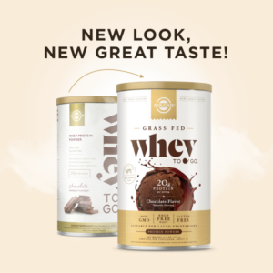 A comparison showing the old design of Solgar's Whey To Go® chocolate-flavored protein powder and a new, adjusted version. Text overlaid reads "New look, same great taste!"