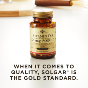 A bottle of Solgar's Vitamin D3 Cholecalciferol softgels on a kitchen surface. Text reads "When it comes to quality, Solgar is the gold standard."