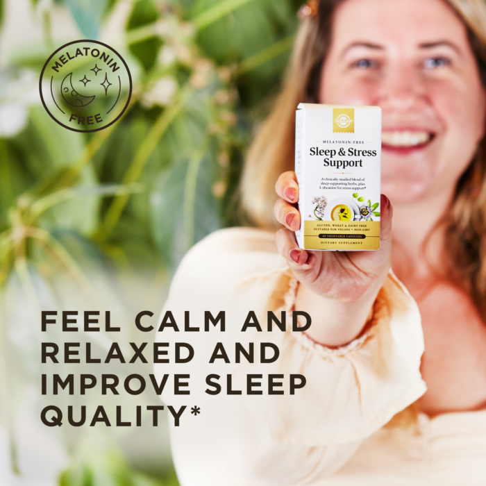 A smiling woman holds a box of Solgar Sleep and Stress Support vegetable capsules. A stamp in the top left says 
