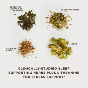 Four small, separate piles of some of the active ingredients in Solgar's Sleep and Stress Support vegetable capsules (green tea, passion flower, valerian root, and hops) lay on a white surface. Text overlaid reads "clinically-studied sleep supporting herbs plus L-theanine for stress support."