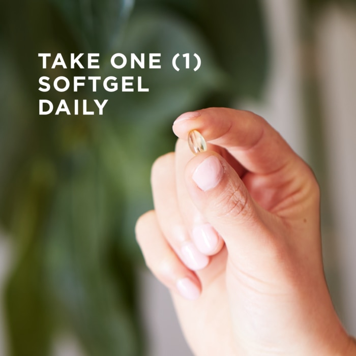 A softgel of Solgar's Vitamin D3 (Cholecalciferol) held between the index finger and thumb of a persons hand. Text reads "Take one softgel daily"