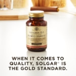 A bottle of Solgar's Vitamin D3 Cholecalciferol softgels on a marble surface. Text reads "When it comes to quality, Solgar is the gold standard."