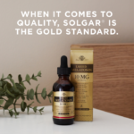 A bottle of Solgar's Liquid Melatonin 10 mg - Natural Black Cherry Flavor next to its outer packaging on an end table next to a bed's headboard. Text reads "When it comes to quality, Solgar is the gold standard."